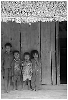 Children in front of rural hut, Hon Chong. Vietnam ( black and white)