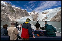 Passengers on the deck of tour boat and Northwestern glacier, Northwestern Lagoon. Kenai Fjords National Park, Alaska, USA.