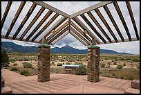Courtyard, sign and mountains, Great Basin Visitor Center. Great Basin National Park ( color)