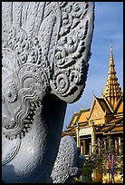Statue and pagoda, Royal palace. Phnom Penh, Cambodia (color)