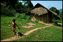 Unclothed child in a minority village, between Lai Chau and Tam Duong. Northwest Vietnam ( color)