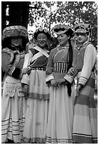 Women wearing Naxi dress. Lijiang, Yunnan, China (black and white)