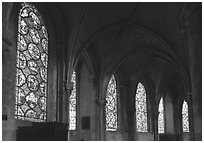 Aisle with tained glass windows, Saint-Etienne Cathedral. Bourges, Berry, France ( black and white)