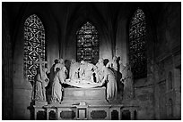 Lit sculpture of Christ laid to rest, St Trophime church. Arles, Provence, France ( black and white)