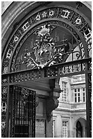 Gate and emblem of the city of Paris, Carnevalet Museum. Paris, France (black and white)