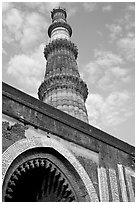 Alai Darweza gate and Qutb Minar tower. New Delhi, India ( black and white)