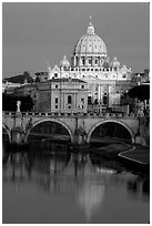 Bridge and Basilic Saint Peter reflected in Tiber River, sunrise. Vatican City (black and white)