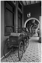 Rickshaws in front gallery, Cheong Fatt Tze Mansion. George Town, Penang, Malaysia (black and white)