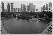 KLCC Park surrounded by high-rise towers. Kuala Lumpur, Malaysia (black and white)