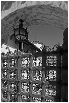 Gate, lamp, and arch, Scotty's Castle. Death Valley National Park, California, USA. (black and white)