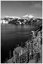 Lake rim in winter with blue skies. Crater Lake National Park ( black and white)