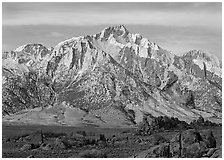 Volcanic boulders in Alabama hills and Lone Pine Peak, sunrise. Sequoia National Park ( black and white)