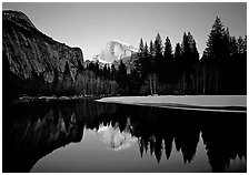 Half-Dome reflected in Merced River near Sentinel Bridge, sunset. Yosemite National Park ( black and white)