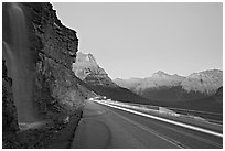 Roadside waterfall and light trail, Going-to-the-Sun road. Glacier National Park, Montana, USA. (black and white)