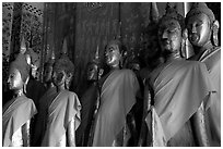 Drapped Buddha statues, Wat Xieng Thong. Luang Prabang, Laos (black and white)