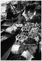 Fruit for sale, floating market. Damonoen Saduak, Thailand (black and white)