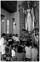 Worshipers at Phra Pathom Chedi. Nakkhon Pathom, Thailand (black and white)