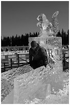 Girl on ice sculpture, George Horner Ice Park. Fairbanks, Alaska, USA (black and white)