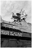 Island and flags,  USS Midway aircraft carrier. San Diego, California, USA (black and white)