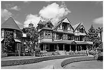 Gardens and facade, morning. Winchester Mystery House, San Jose, California, USA (black and white)