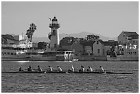Women Rowers and lighthouse, early morning. Marina Del Rey, Los Angeles, California, USA (black and white)