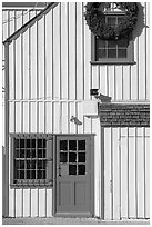 Wooden house with bright blue door. Marina Del Rey, Los Angeles, California, USA (black and white)