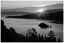 Sun shining under clouds, Emerald Bay and Lake Tahoe, California. USA (black and white)