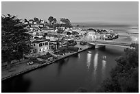 Bridges over Soquel Creek and village at dusk. Capitola, California, USA ( black and white)