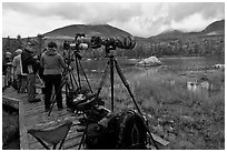 Cameras set up with telephoto lenses, Sandy Stream Pond. Baxter State Park, Maine, USA (black and white)