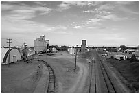 Railroad, grain elevator, and fertilizer plant, Bowman. North Dakota, USA (black and white)