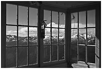 Mountains seen through windows of Hidden Lake Lookout. Washington ( black and white)