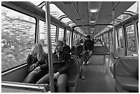 Riders in monorail. Seattle, Washington (black and white)