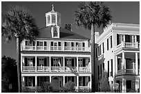 Antebellum house with flag and octogonal tower. Charleston, South Carolina, USA (black and white)