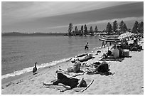 Families on sandy beach, Lake Tahoe-Nevada State Park, Nevada. USA (black and white)