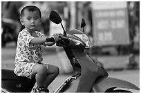 Boy on scooter. Can Tho, Vietnam (black and white)