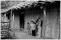Family outside their home. Northeast Vietnam (black and white)