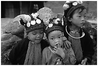 Black Dzao children wearing the hat with three coins, between Tam Duong and Sapa. Northwest Vietnam ( black and white)