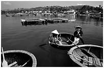 Circular basket boats, typical of the central coast, Nha Trang. Vietnam ( black and white)