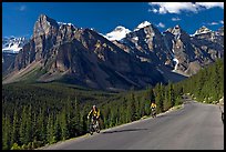 Cyclists on the road to the Valley of Ten Peaks. Banff National Park, Canadian Rockies, Alberta, Canada (color)