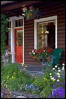 Flowered porch of a wooden cabin. Banff National Park, Canadian Rockies, Alberta, Canada