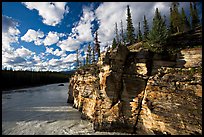 Cliff and Athabasca River, late afternoon. Jasper National Park, Canadian Rockies, Alberta, Canada (color)