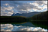 Peaks and clouds reflected in Leach Lake, sunset. Jasper National Park, Canadian Rockies, Alberta, Canada (color)