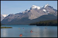 Canoes on Maligne Lake, afternoon. Jasper National Park, Canadian Rockies, Alberta, Canada (color)