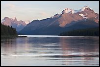 Peaks reflected in rippled water, Maligne Lake, sunset. Jasper National Park, Canadian Rockies, Alberta, Canada (color)