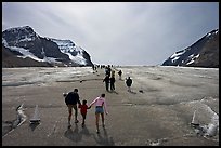 Tourists on Athabasca Glacier, Columbia Icefield. Jasper National Park, Canadian Rockies, Alberta, Canada (color)