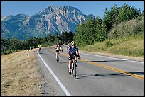 Cyclists on road. Waterton Lakes National Park, Alberta, Canada ( color)