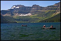 Canoists on Cameron Lake. Waterton Lakes National Park, Alberta, Canada ( color)