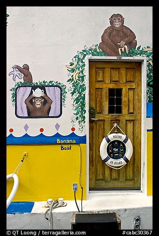 Door of houseboat decorated with a monkey theme. Victoria, British Columbia, Canada