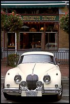 Classic car in front of Spaghetti Factory restaurant. Vancouver, British Columbia, Canada (color)