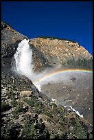 Rainbow formed in the mist of Takakkaw Falls. Yoho National Park, Canadian Rockies, British Columbia, Canada